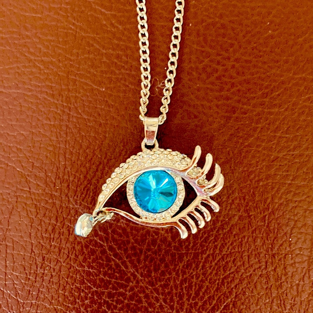 Necklace sterling silver. Eye devil silver tone. NWOT never worn.